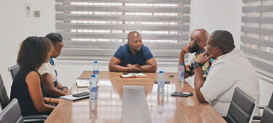 JuaKali Events team briefing a client across the boardroom table